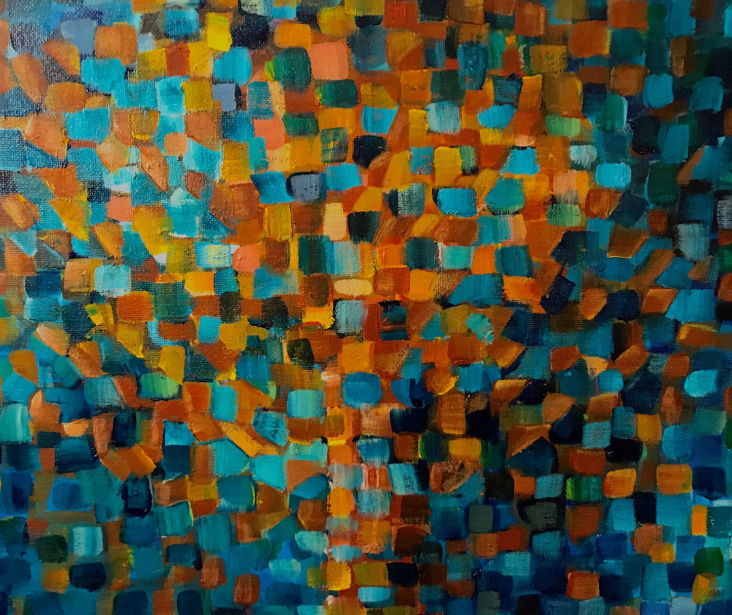 Colorful abstract mosaic pattern with squares in various shades of blue, orange, and green.